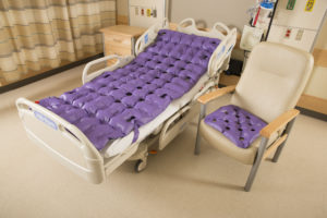Waffle Pressure Care Overlay and cushion in hospital room