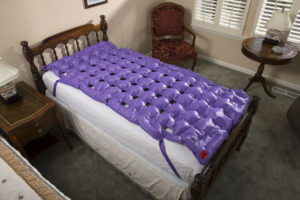 Waffle Overlay purple on bed, pressure care at home