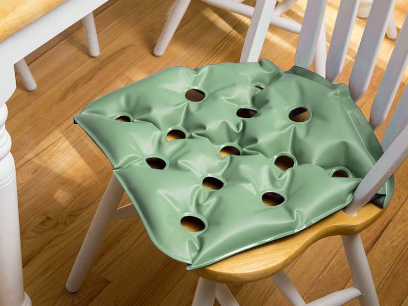 Waffle Cushion green on chair